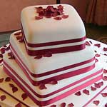pink rose petals wedding cake